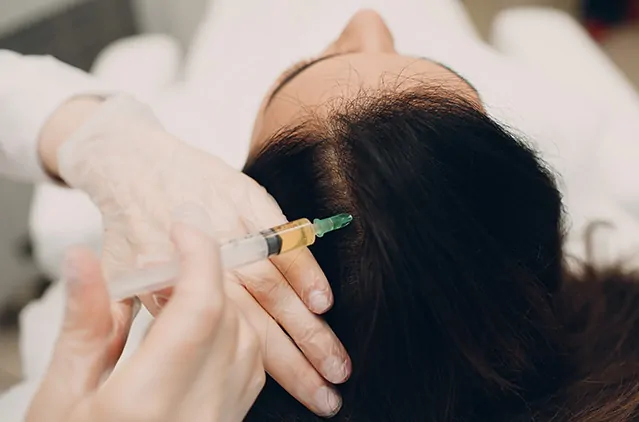 Hair regrowth treatment with QR678